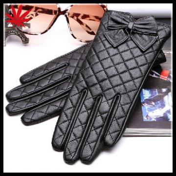 women&#39;s quilting seam back leather gloves with bow details